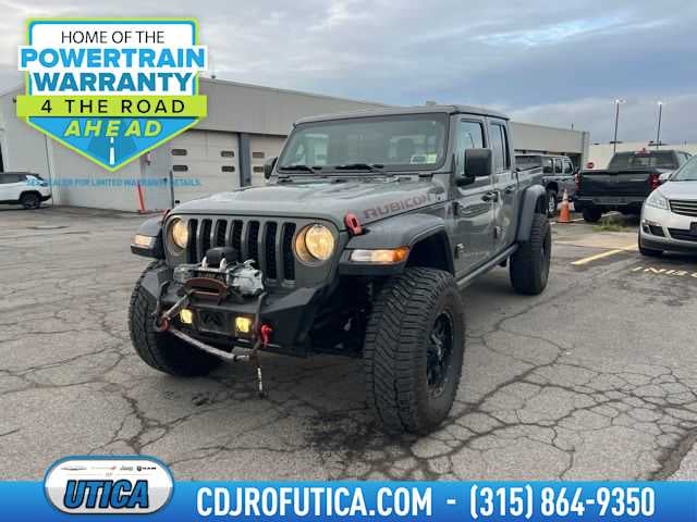 2020 Jeep Gladiator Rubicon in Sting-Gray Clearcoat — front three-quarter view
