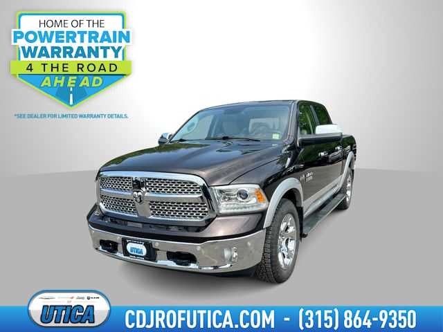 2017 RAM 1500 Laramie Crew Cab 4x4 5'7' Box in Luxury Brown Pearlcoat — front three-quarter view