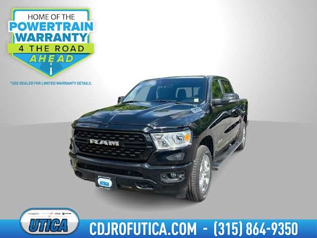 2023 RAM 1500 Big Horn Crew Cab 4x4 5'7' Box in Diamond Black Crystal Pearlcoat — front three-quarter view