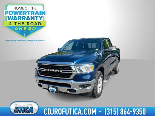 2023 RAM 1500 Big Horn Quad Cab 4x4 6'4' Box in Patriot Blue Pearlcoat — front three-quarter view