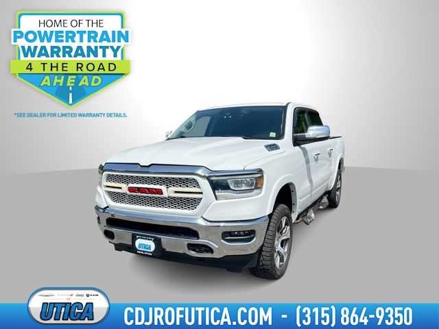2021 RAM 1500 Laramie Crew Cab 4x4 5'7' Box in Bright White Clearcoat — front three-quarter view