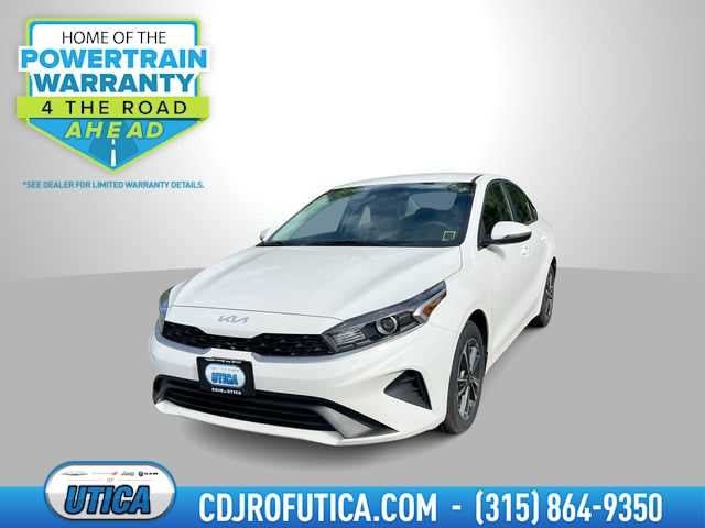 2024 Kia Forte LXS in Snow White Pearl — front three-quarter view