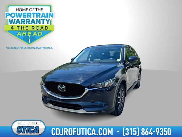 2018 Mazda Mazda CX-5 Grand Touring in Deep Crystal Blue Mica — front three-quarter view