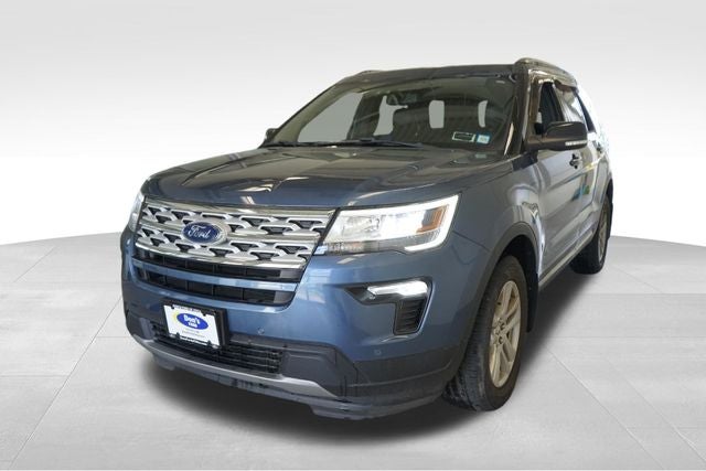 2018 Ford Explorer XLT in Blue Metallic — front three-quarter view