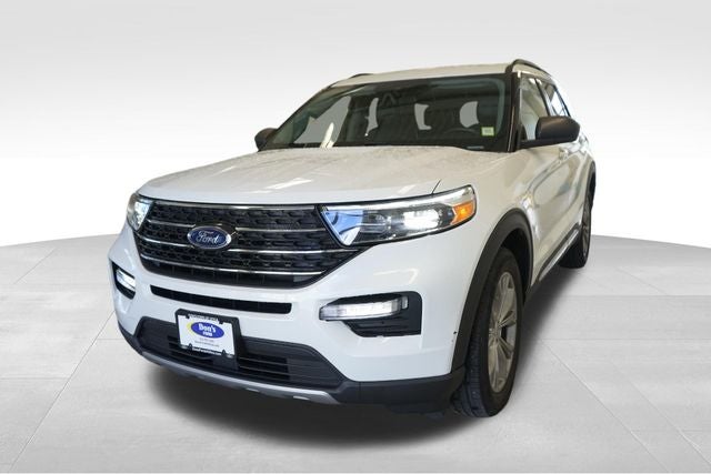 2023 Ford Explorer XLT in White Metallic — front three-quarter view