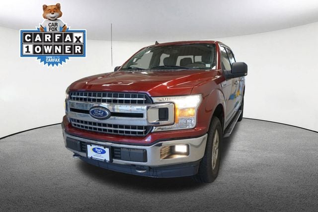 2019 Ford F-150 XLT in Ruby Red Metallic Tinted Clearcoat — front three-quarter view