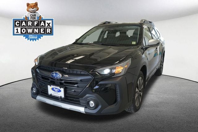 2025 Subaru Outback Touring in Crystal Black Silica — front three-quarter view