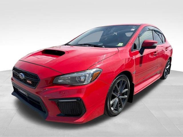 2018 Subaru WRX Limited in Pure Red — front three-quarter view