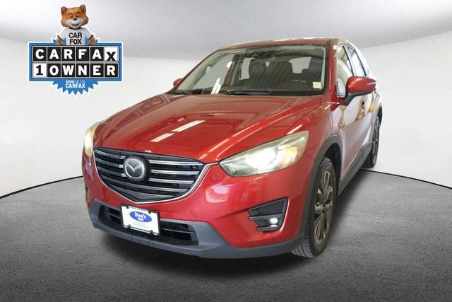 2016 Mazda Mazda CX-5 Grand Touring in Soul Red Metallic — front three-quarter view