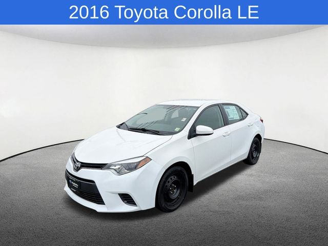 2016 Toyota Corolla LE in Super White — front three-quarter view