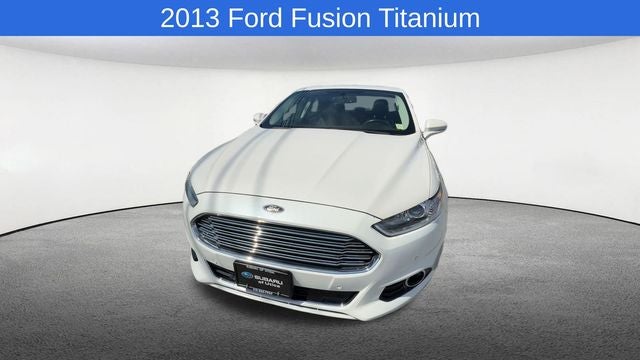 2013 Ford Fusion — rear three-quarter view
