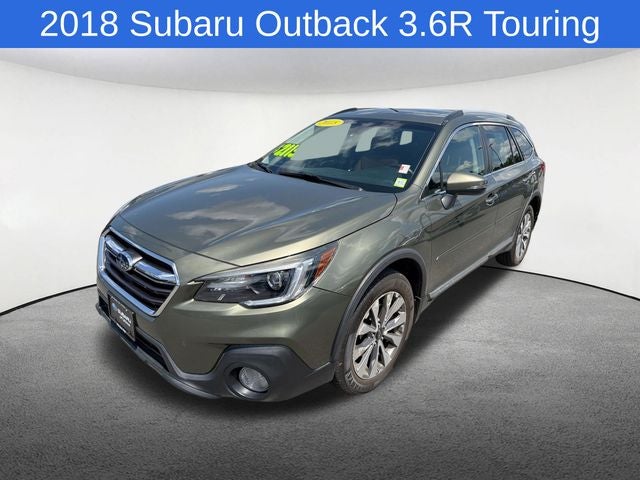 2018 Subaru Outback 3.6R Touring in Wilderness Green Metallic — front three-quarter view
