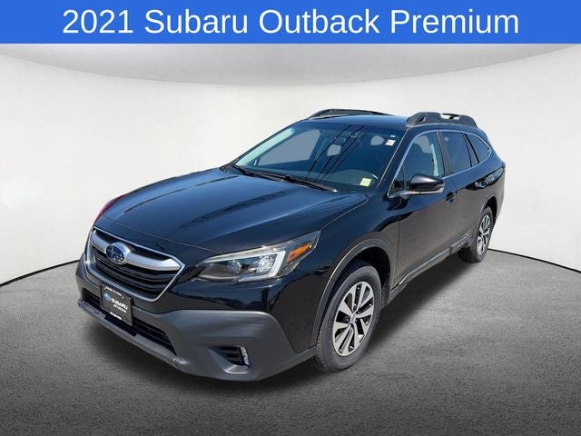 2021 Subaru Outback Premium in Crystal Black Silica — front three-quarter view