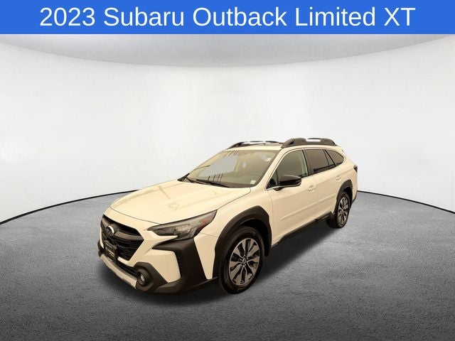 2023 Subaru Outback Limited XT in Crystal White Pearl — front three-quarter view