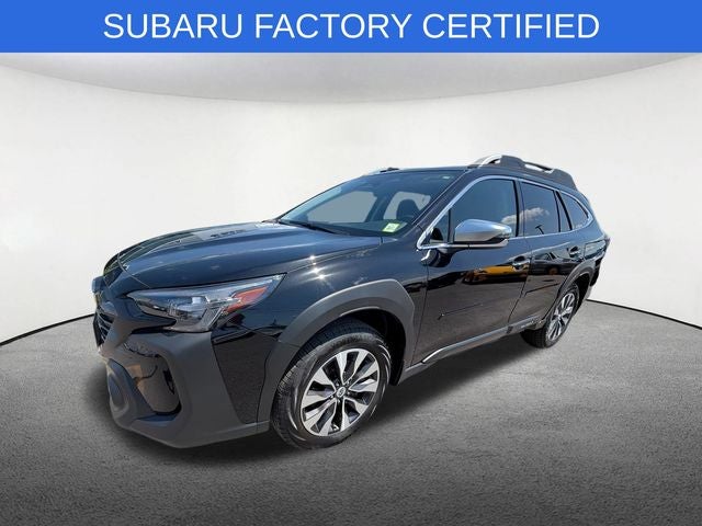 2025 Subaru Outback Touring XT in Crystal Black Silica — front three-quarter view