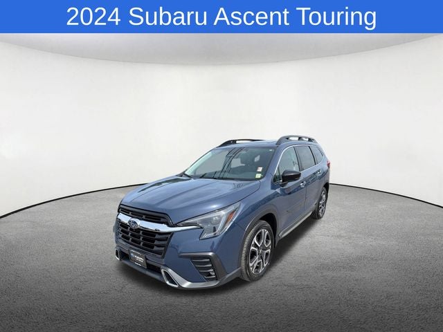 2024 Subaru Ascent Touring in Cosmic Blue — front three-quarter view