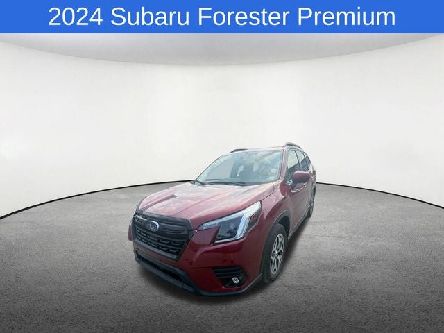 2024 Subaru Forester Premium in Crimson Red Pearl — front three-quarter view