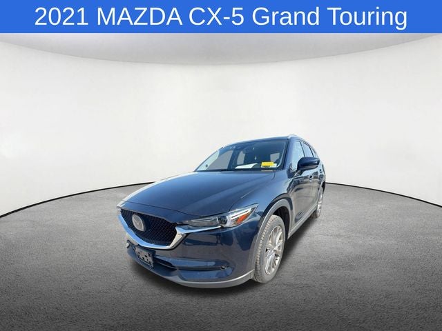 2021 Mazda Mazda CX-5 Grand Touring in Deep Crystal Blue Mica — front three-quarter view